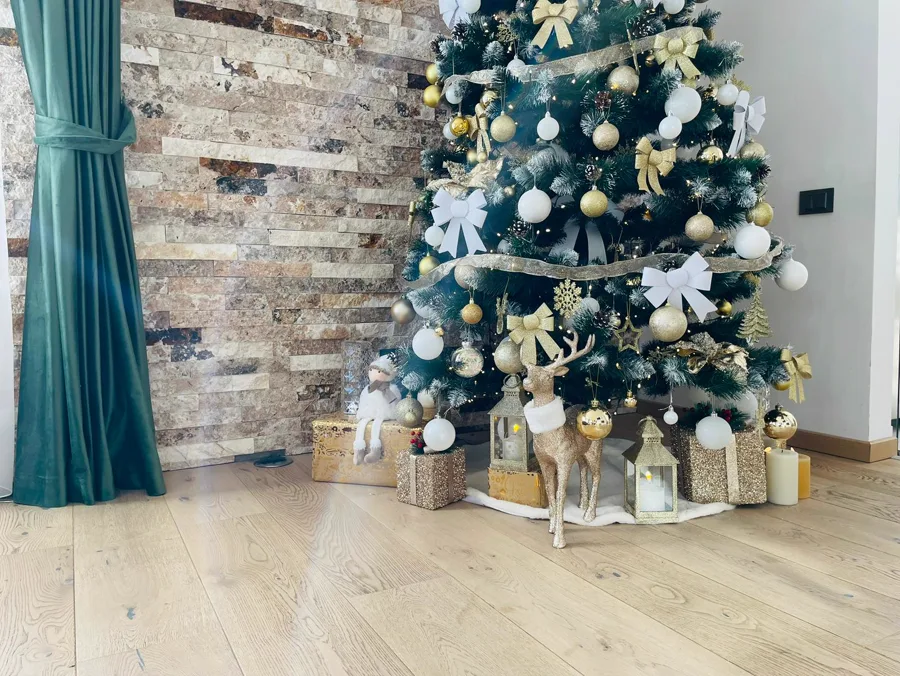 Christmas tree with ornaments and decorative reindeer